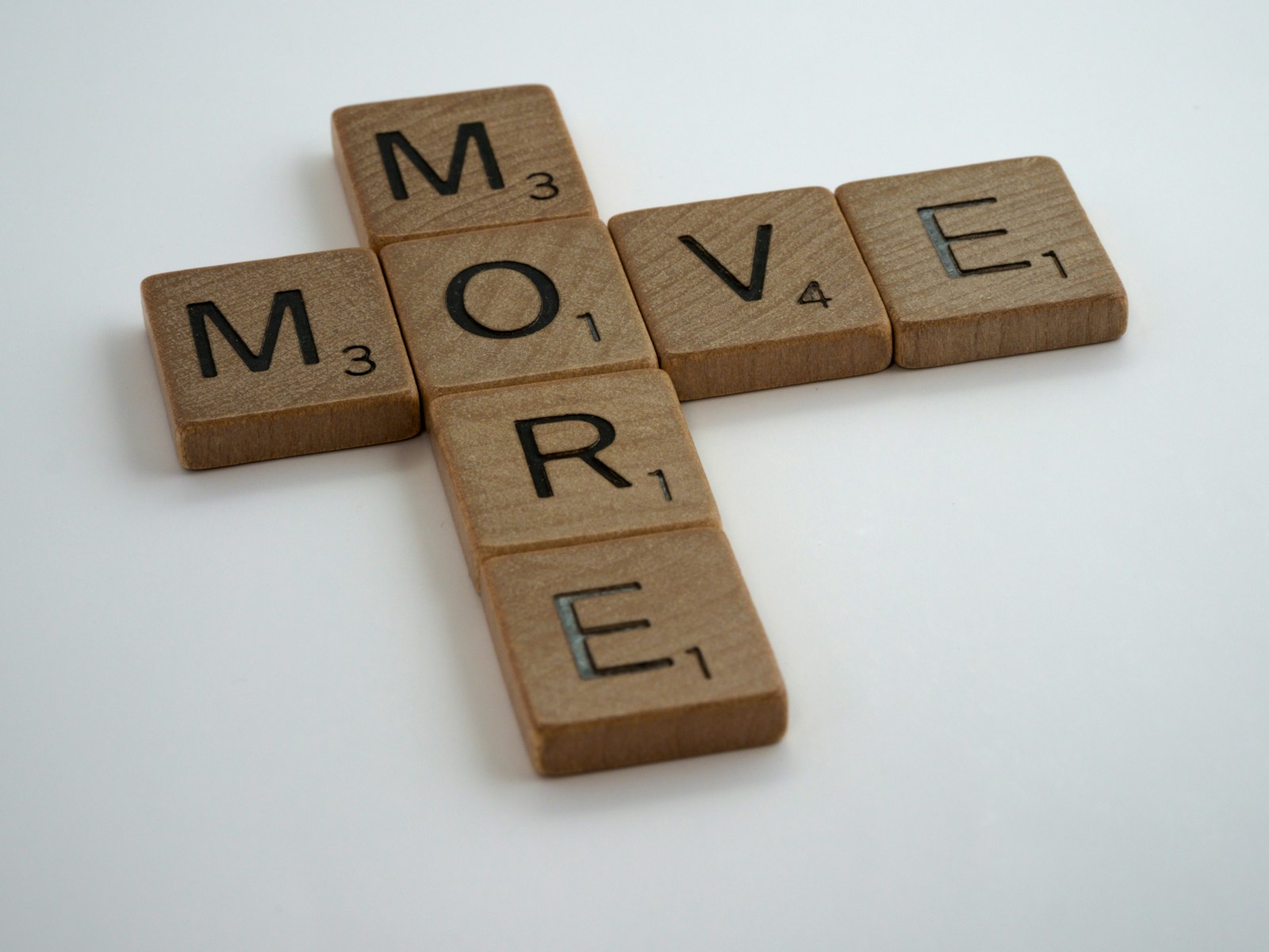 Move to think - move more brown wooden letter t-letter